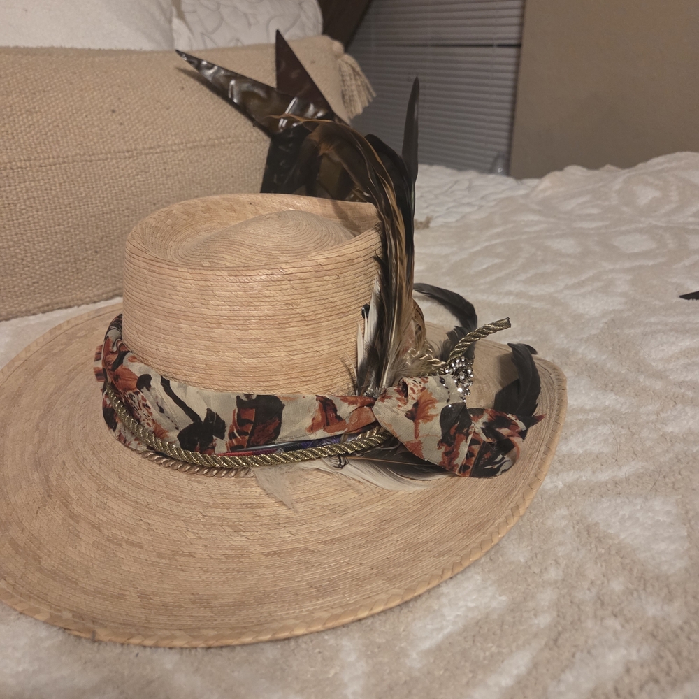 Stylish Tan Hat with Feather and Patterned Band